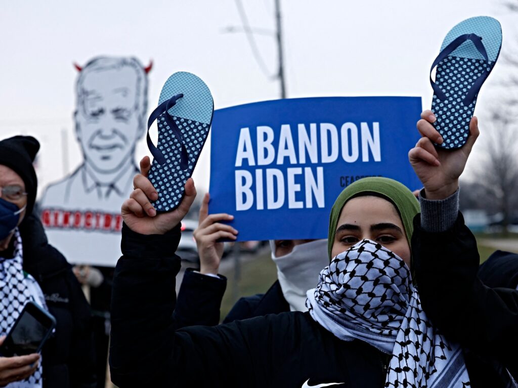 People gather in support of Palestinians outside of the venue where US President Joe Biden is speaking to members of the United Auto Workers (UAW) at the UAW National Training Center, in Warren, Michigan, on February 1, 2024. (Photo by JEFF KOWALSKY / AFP)