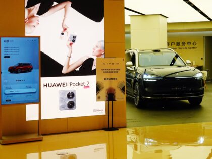 An AITO M9 car is being displayed at a Huawei store in Yichang, Hubei Province, China, on