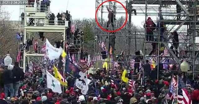 J6 Footage Shows Man Firing Gun into Air After Climbing Scaffolding