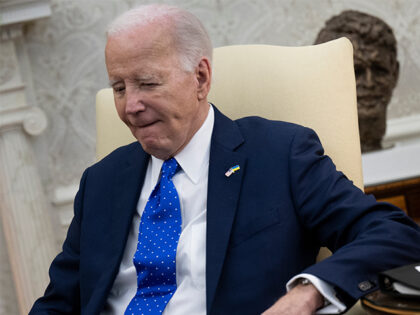 US President Joe Biden listens during a meeting with German Chancellor Olaf Scholz in the