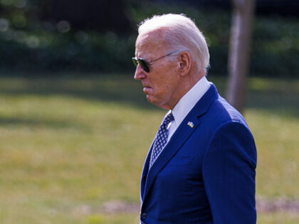 President Joe Biden walks on the South Lawn of the White House in Washington, DC, on Febru