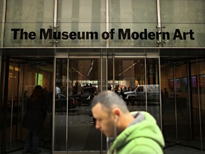 NEW YORK, NY - APRIL 11: A man walks by the Museum of Modern Art (MoMA) on April 11, 2013