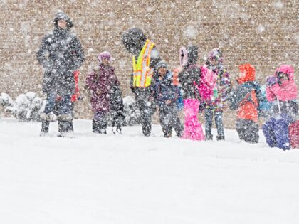 TORONTO, Feb. 28, 2019-- Elementary school students wait for picking up due to school bus