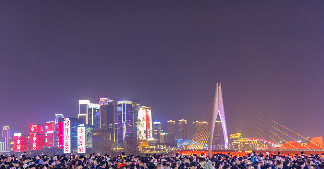 China Claims Largest Travel Season Ever, Seeking to Calm Worried Investors
