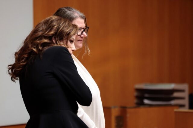 Jennifer Crumbley (R), the Michigan mother of Oxford School shooter Ethan Crumbley, was fo