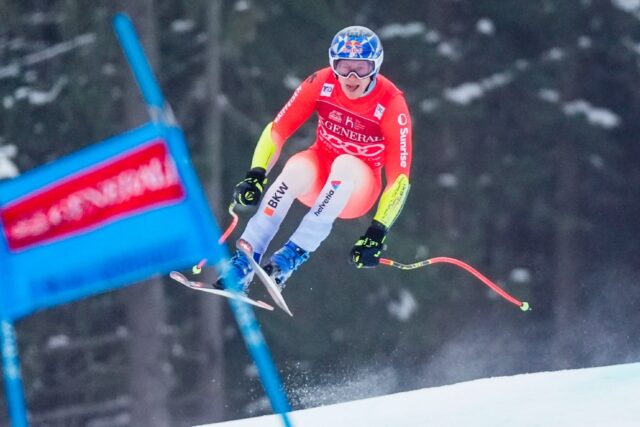 Marco Odermatt clinched his third Alpine Skiing World Cup crown on Saturday with victory i