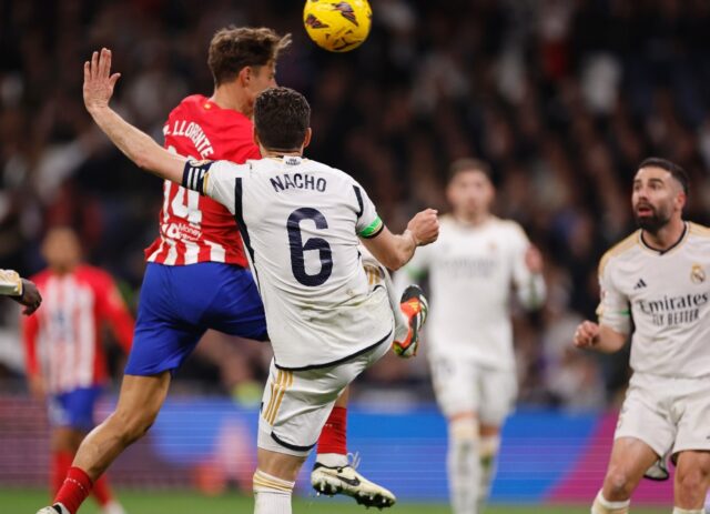 Marcos Llorente heads home the equaliser for Atletico Madrid in the 1-1 draw with rivals