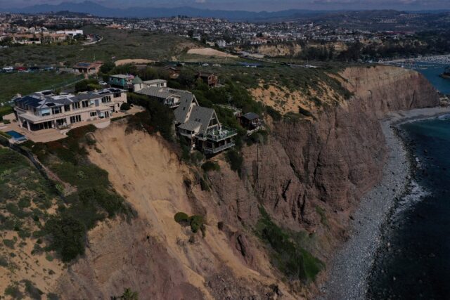 No bluff: A landslide has brought these clifftop California homes a little closer to the e