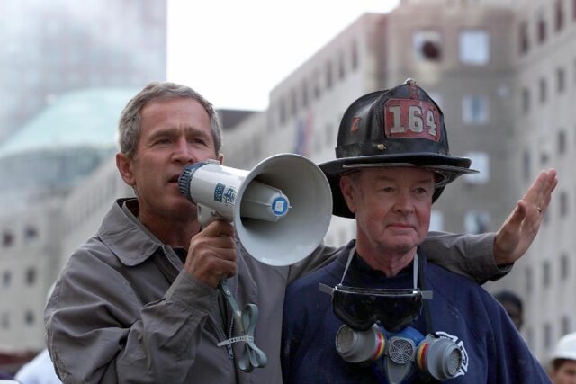 President Bush speaks atop the ruins of the Twin Towers following the September 11, 2001 t