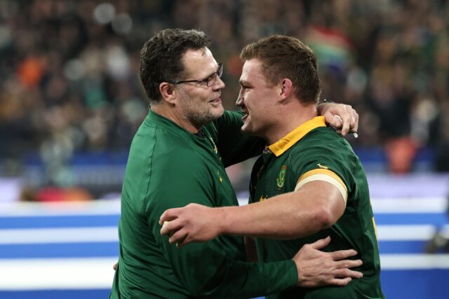 Rassie Erasmus (L) eyes a historic third successive Rugby World Cup title after committing