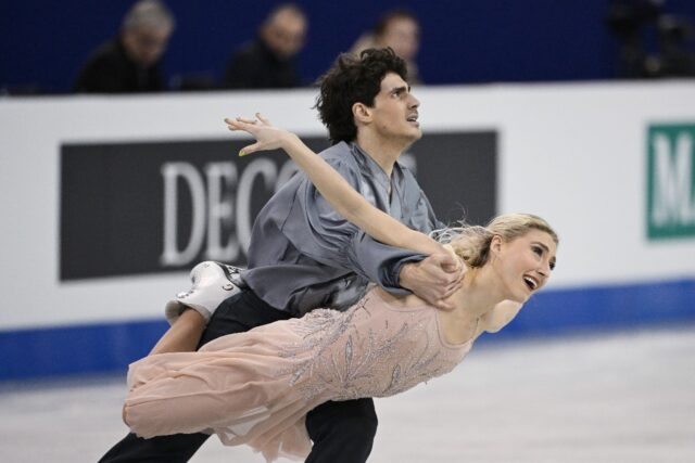 Sailing across the ice in billowing steel grey and baby pink, Gilles and Poirier wowed the