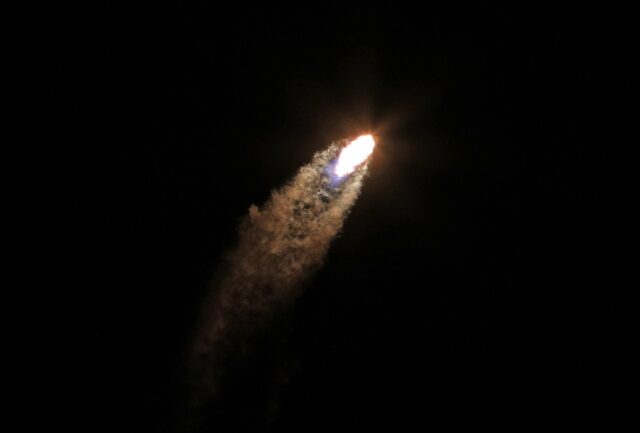 A SpaceX Falcon 9 rocket soars into orbit from the Kennedy Space Center on the Intuitive M