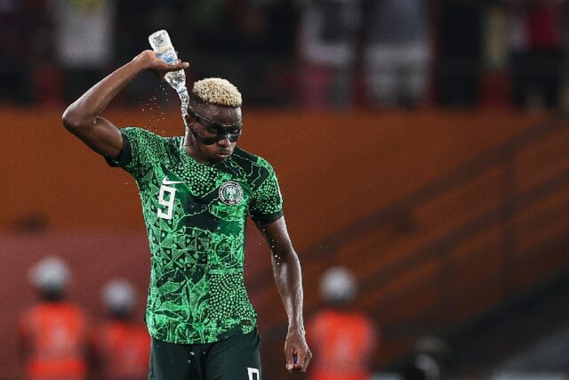 Victor Osimhen cools off during Nigeria's 1-0 win over Angola in the quarter-finals of the