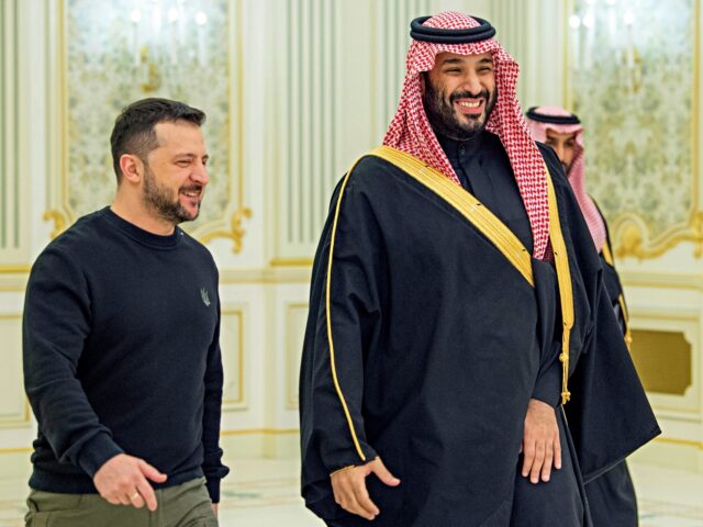In this photo provided by the Saudi Royal Palace, Saudi Crown Prince Mohammed bin Salman,