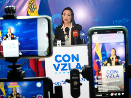 Opposition presidential hopeful Maria Corina Machado gives a press conference at her campa
