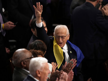 Rep. Bill Pascrell, D-N.J., holds up four fingers for 'four more years' as Presi