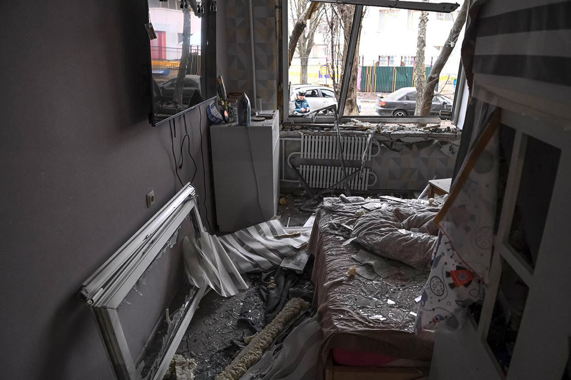 This photo released by Belgorod region governor Vyacheslav Gladkov's telegram channel on Saturday, March 16, 2024, shows damage to a flat in an apartment building after shelling from the Ukrainian side, in Belgorod, Russia. A Russian regional governor says two people have been killed in Ukrainian shelling of the city of Belgorod, close to the border with Ukraine. Three others were wounded. (Belgorod region governor Vyacheslav Gladkov telegram channel via AP)