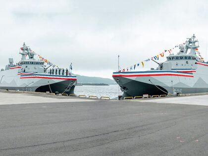 In this photo released by the Taiwan Presidential Office, newly commissioned navy ships ar