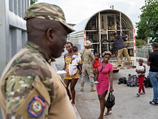 OUANAMINTHE, HAITI - SEPTEMBER 19: A photo taken from Haiti shows Haitians deported from D