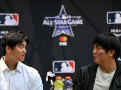 DENVER, CO - JULY 12: Shohei Ohtani #17 of the Los Angeles Angels and interpreter Ippei Mi