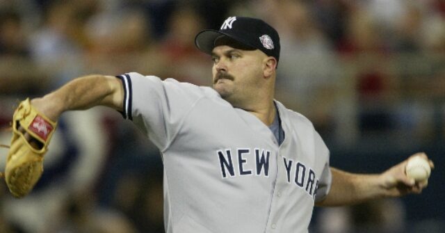 David Wells Knocks VA Official over WWII Victory Kiss Photo Controversy