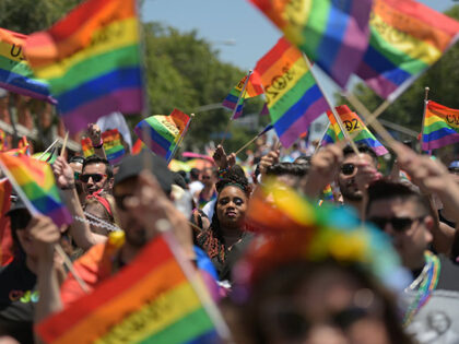 People participate in the annual LA Pride Parade in West Hollywood, California, on June 9,