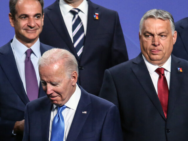 Kyriakos Mitsotakis, Greece's prime minister, left, US president Joe Biden, center, and Vi