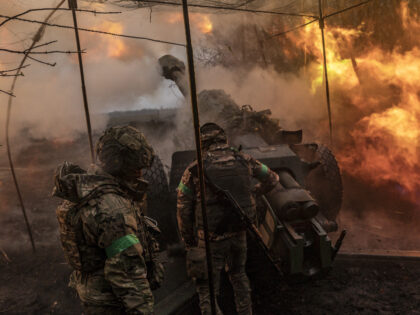DONETSK OBLAST, UKRAINE - APRIL 13: Ukrainian soldiers of the 80th brigade firing artiller