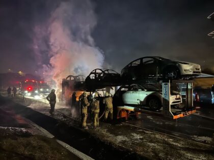 ISTANBUL, TURKIYE - OCTOBER 06: Six Tesla electric cars burn on the trailer of the moving