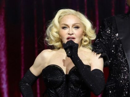 Madonna and Bob the Drag Queen perform during The Celebration Tour at The O2 Arena on Octo