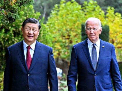 Chinese President Xi Jinping and U.S. President Joe Biden take a walk after their talks in