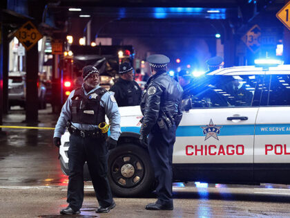 Chicago police conduct an investigation after a shooting on Wabash Avenue between Madison