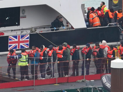 A group of people thought to be migrants are brought in to Dover, Kent, from a Border Forc