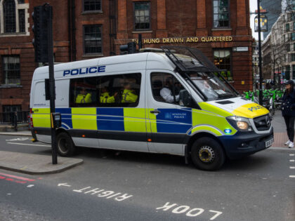 LONDON, ENGLAND - FEBRUARY 28: A police van on an emergency call drives along a cycle lane