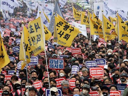 South Korean doctors participate in a rally against the government's medical policy o