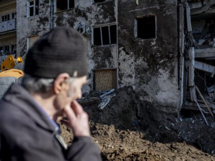KHERSON, UKRAINE - MARCH 9: Authorities and neighbors works to restore damaged buildings a