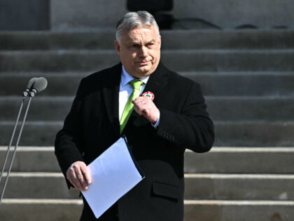 Hungarian Prime Minister Viktor Orban waits to deliver a speech on March 15, 2024 in front
