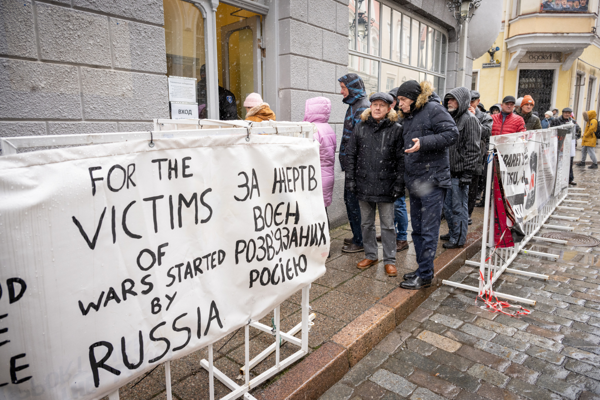 Voters queue in front of the Russian Embassy in Tallinn on March 17, 2024 during Russia's presidential election. (Photo by RAIGO PAJULA / AFP) (Photo by RAIGO PAJULA/AFP via Getty Images)