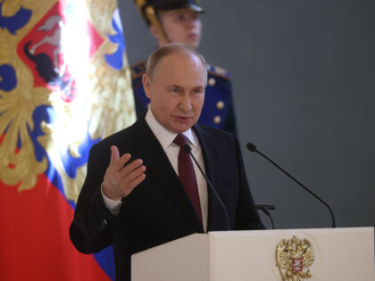MOSCOW, RUSSIA - MARCH 20 (RUSSIA OUT) Russian President Vladimir Putin gestures during hi