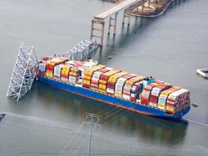 BALTIMORE, MARYLAND - MARCH 26: In an aerial view, the cargo ship Dali sits in the water a