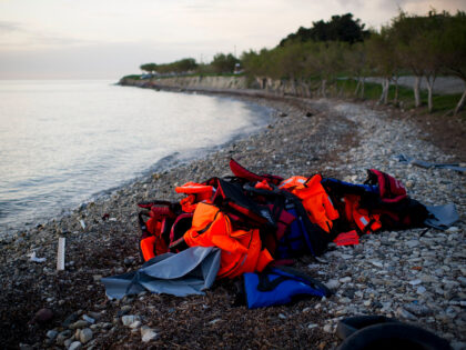 MYTELENE, GREECE - MARCH 09: Life vests are seen after an inflatable boat with refugees ar