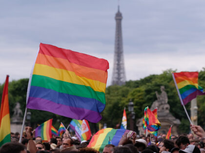 PARIS, FRANCE - JUNE 24, 2017: A rainbow flag, commonly known as the gay pride flag or LGB