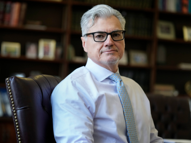 Judge Juan Merchan poses for a picture in his chambers in New York, Thursday, March 14, 2024. Merchan could become the first judge ever to oversee a former U.S. president’s criminal trial. He's presiding over Donald Trump’s hush money case in New York. (AP Photo/Seth Wenig)