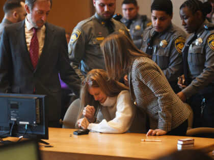 Michelle Troconis listens as a verdict of guilty on all counts is read on the final day ju