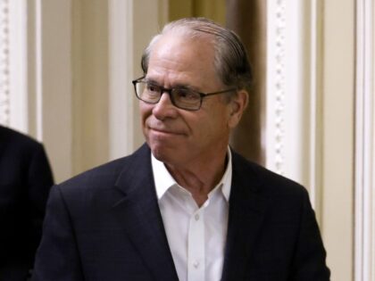 Sen. Mike Braun (R-IN) arrives to a luncheon with Senate Republicans at the U.S. Capitol o