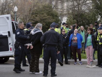 Abortion-rights activists are arrested by U.S. Capitol police as their protest outside of