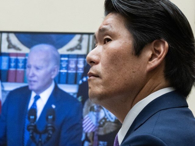 Special Counsel Robert K. Hur watches a video of President Joe Biden during the House Judi