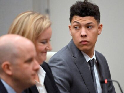 Jackson Mahomes sits with his attorneys at a hearing Wednesday, Jan. 3, 2024, in Johnson C