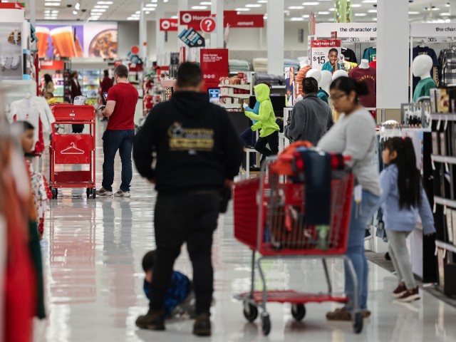 Shoppers at a Target store ahead of Black Friday in Smyrna, Georgia, US, on Tuesday, Nov. 21, 2023. An estimated 182 million people are planning to shop from Thanksgiving Day through Cyber Monday, the most since 2017, according to the National Retail Federation. Photographer: Elijah Nouvelage/Bloomberg via Getty Images