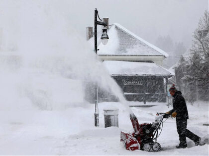 TRUCKEE, CALIFORNIA - MARCH 03: A person uses a snowblower during a powerful multiple day